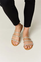 Women's rhinestone three-strap flat sandals by Trendsi featuring sparkly details and comfortable summer footwear design