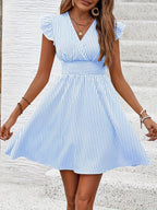Women's mini dress by FitiqueFit featuring a V-neck, flutter sleeves, and striped pattern, perfect for casual summer wear.